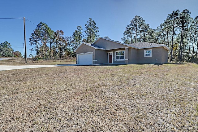 single story home featuring a garage