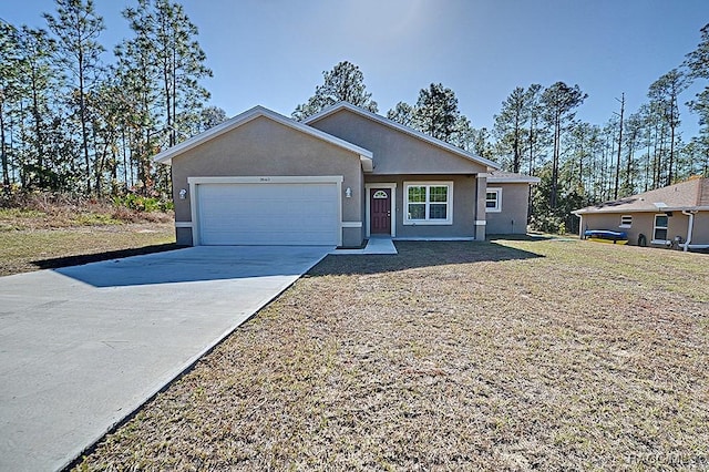 single story home with a front yard and a garage