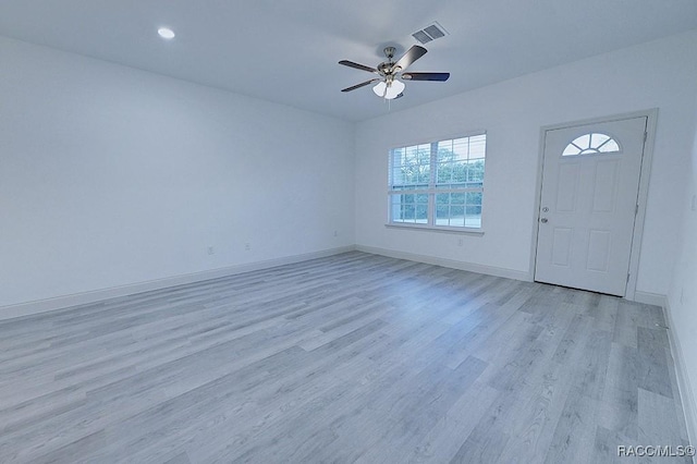 foyer entrance featuring light hardwood / wood-style floors and ceiling fan