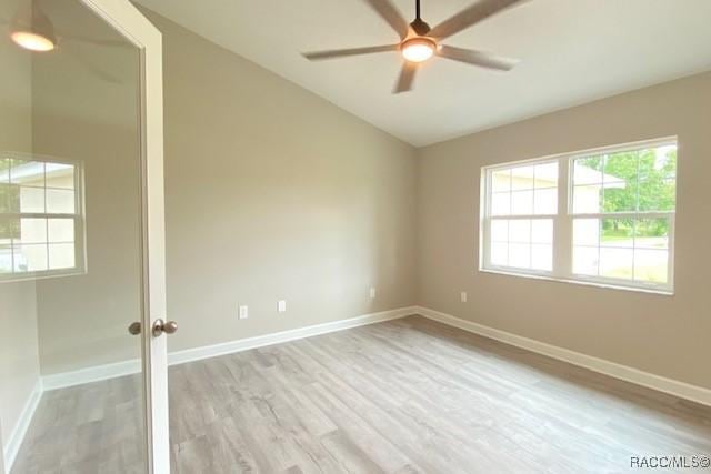 653 E Connecticut Ln, Hernando, FL 34442 - spare room with light wood-style floors, a ceiling fan, and vaulted ceiling