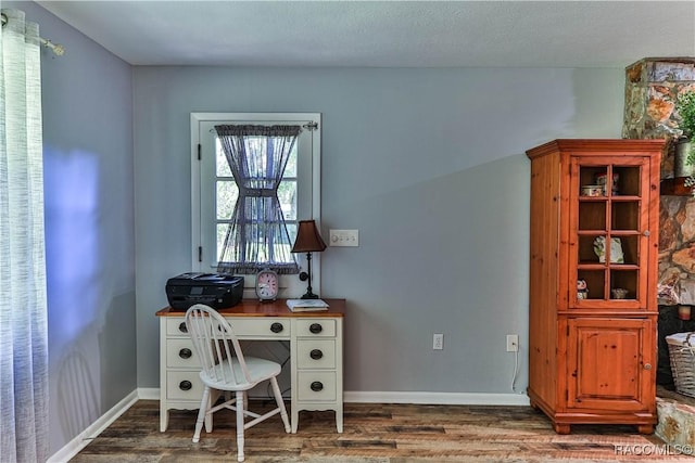 office with a textured ceiling and dark hardwood / wood-style floors