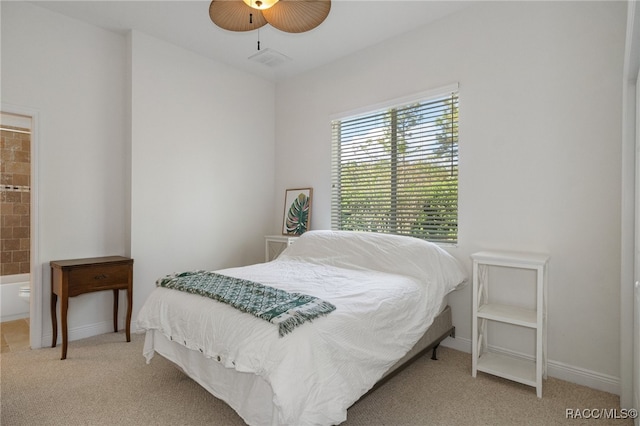 carpeted bedroom featuring visible vents, ceiling fan, and baseboards