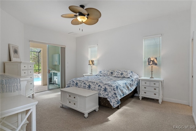 bedroom with access to exterior, light colored carpet, ceiling fan, and baseboards