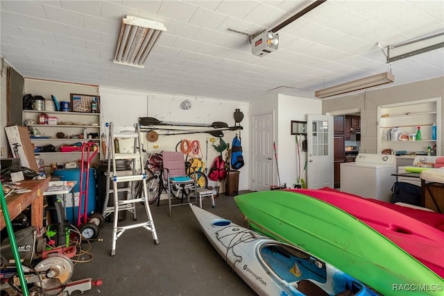 4015 E Parsons Point Rd, Hernando, FL 34442 - garage featuring a garage door opener and washer and dryer