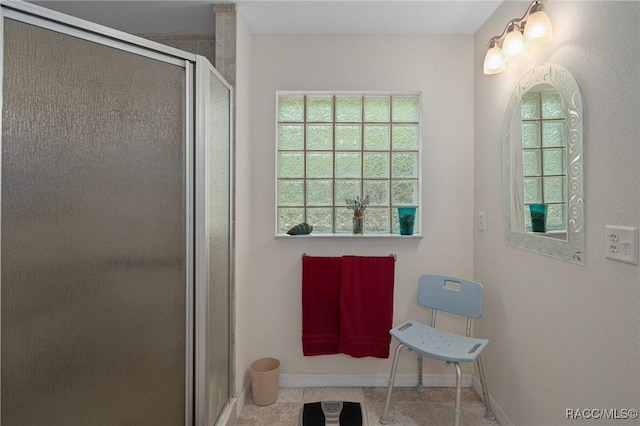 4015 E Parsons Point Rd, Hernando, FL 34442 - bathroom with a stall shower and tile patterned flooring