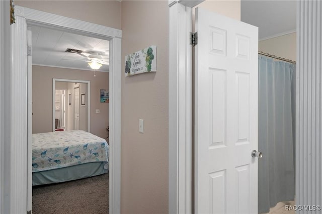 4015 E Parsons Point Rd, Hernando, FL 34442 - bedroom with ornamental molding and carpet flooring