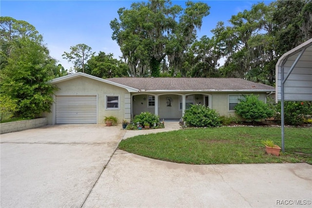 4015 E Parsons Point Rd, Hernando, FL 34442 - view of front of property with a garage, concrete driveway, covered porch, a front yard, and stucco siding