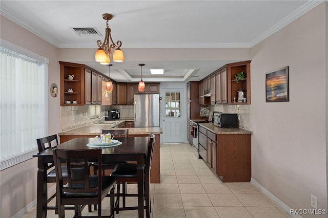 4015 E Parsons Point Rd, Hernando, FL 34442 - kitchen with open shelves, appliances with stainless steel finishes, a peninsula, tasteful backsplash, and under cabinet range hood
