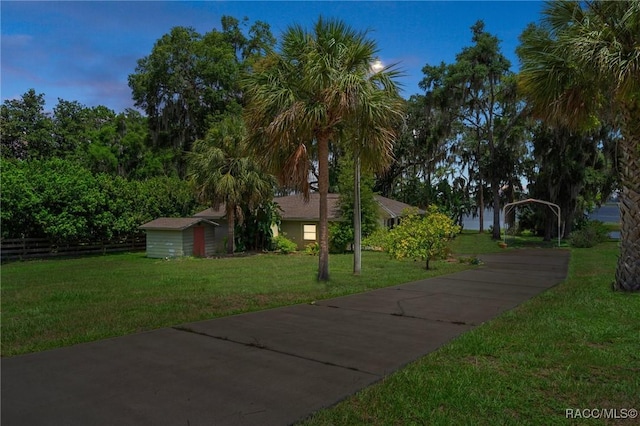 4015 E Parsons Point Rd, Hernando, FL 34442 - view of front of home featuring a yard, a carport, and concrete driveway