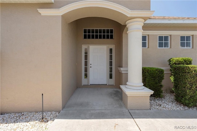 1918 W Crystal Mae Path, Lecanto, FL 34461 - view of exterior entry with stucco siding