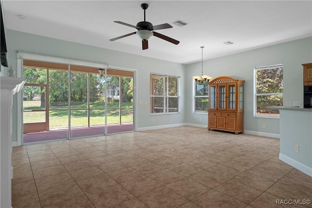 1918 W Crystal Mae Path, Lecanto, FL 34461 - empty room with visible vents, baseboards, tile patterned flooring, and ceiling fan with notable chandelier