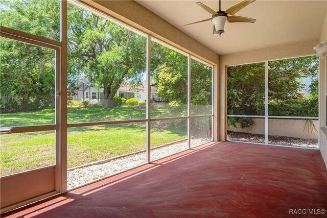 1918 W Crystal Mae Path, Lecanto, FL 34461 - unfurnished sunroom featuring plenty of natural light and ceiling fan