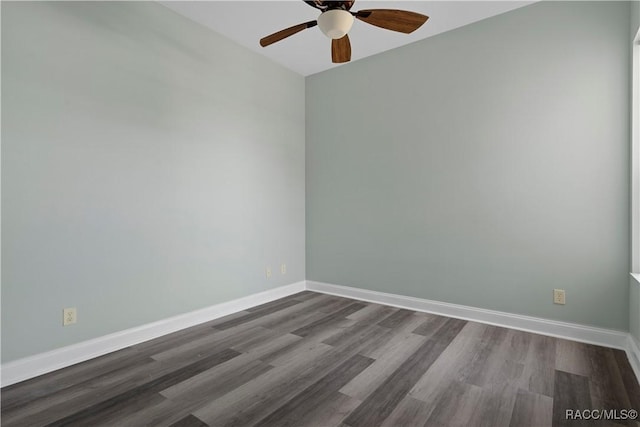 1918 W Crystal Mae Path, Lecanto, FL 34461 - spare room with baseboards, ceiling fan, and dark wood-style floors