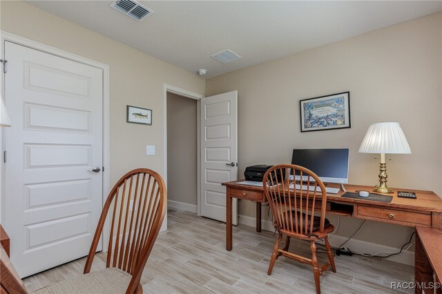 office area featuring light wood-type flooring