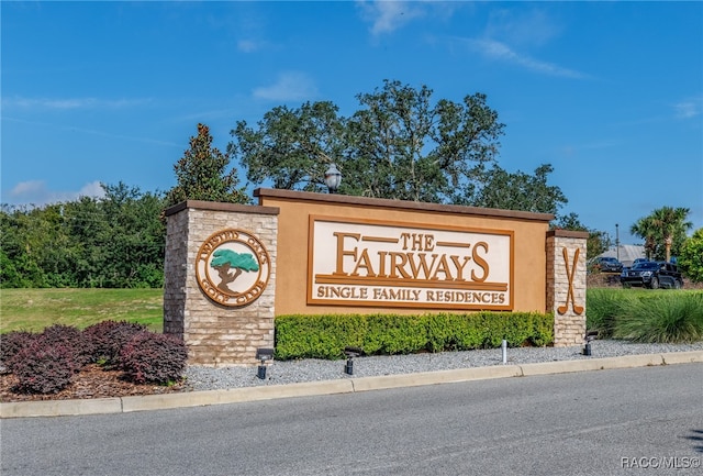 view of community sign