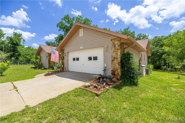 1179 N Point Lonesome Rd, Inverness, FL 34453 - view of property exterior with concrete driveway, an attached garage, and stucco siding