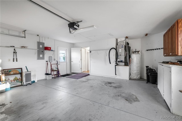 garage with gas water heater, a garage door opener, electric panel, and heating unit