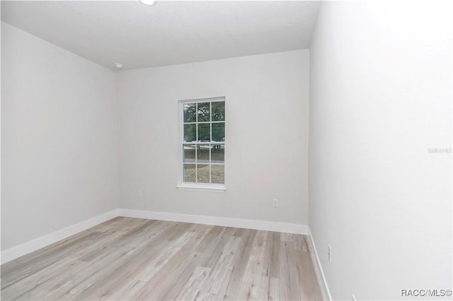 empty room featuring light hardwood / wood-style floors