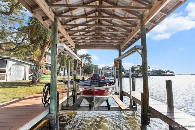 dock area with a water view