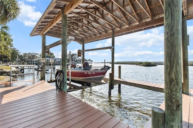 dock area featuring a water view