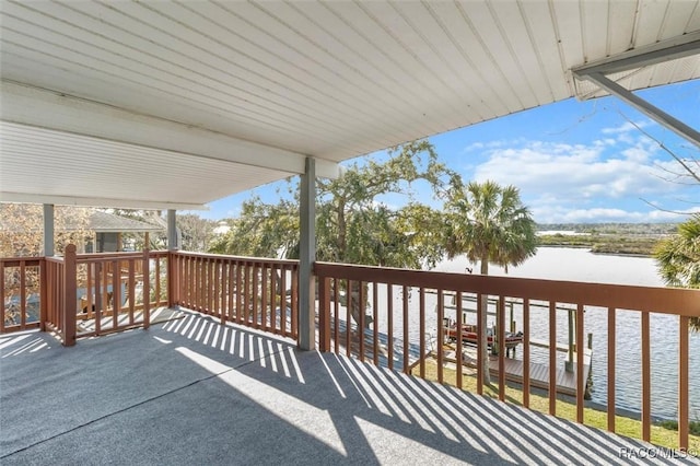 deck featuring a water view