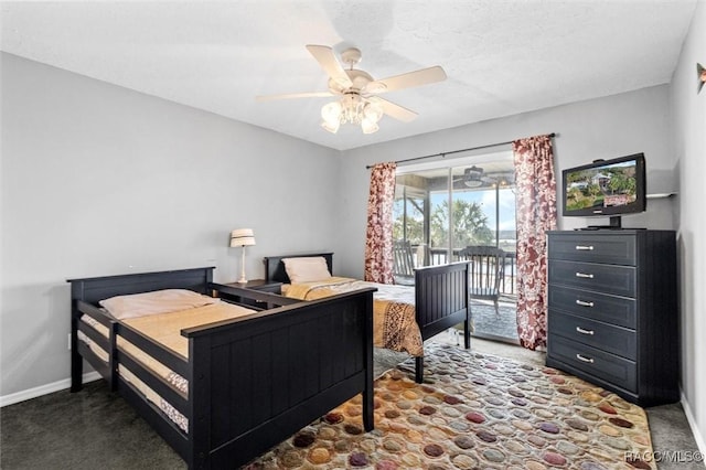 carpeted bedroom featuring access to outside and ceiling fan