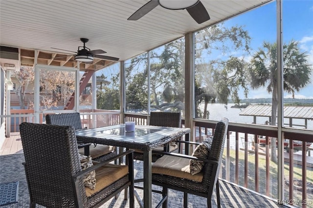 wooden terrace featuring ceiling fan