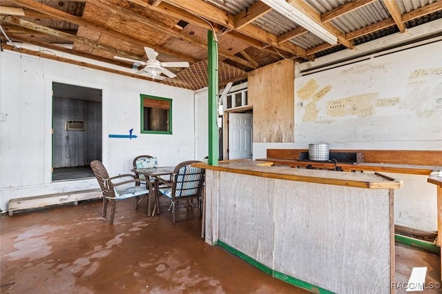 interior space featuring ceiling fan