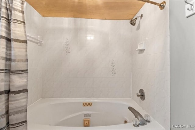 bathroom with shower / bath combination with curtain