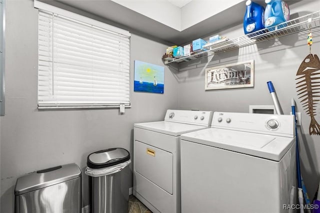 laundry room with separate washer and dryer