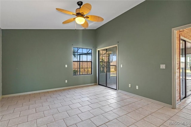 tiled empty room with ceiling fan