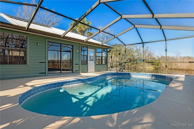 view of pool featuring a patio and a lanai