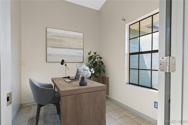 office with light tile patterned flooring