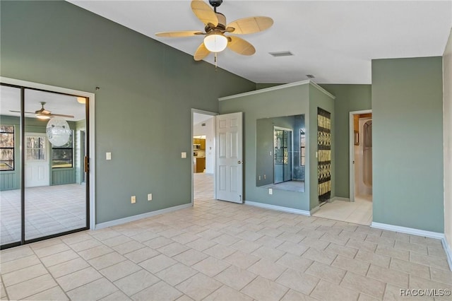 interior space with ceiling fan and lofted ceiling