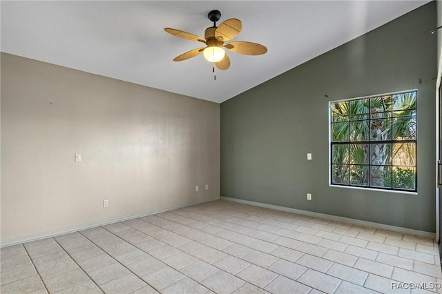 tiled spare room with ceiling fan and lofted ceiling