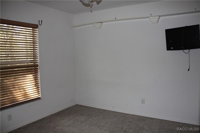 bathroom with vanity, toilet, and tile patterned flooring