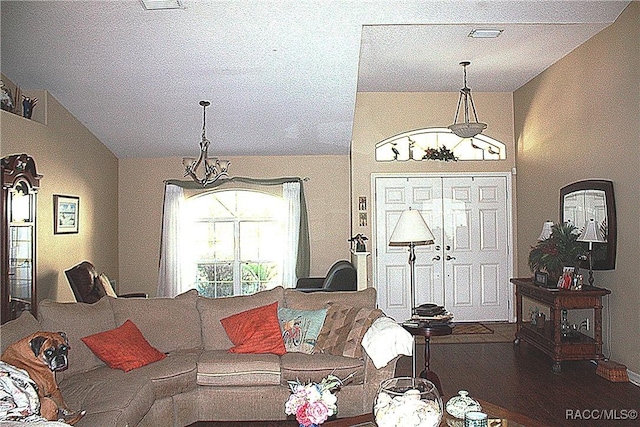 living room with vaulted ceiling