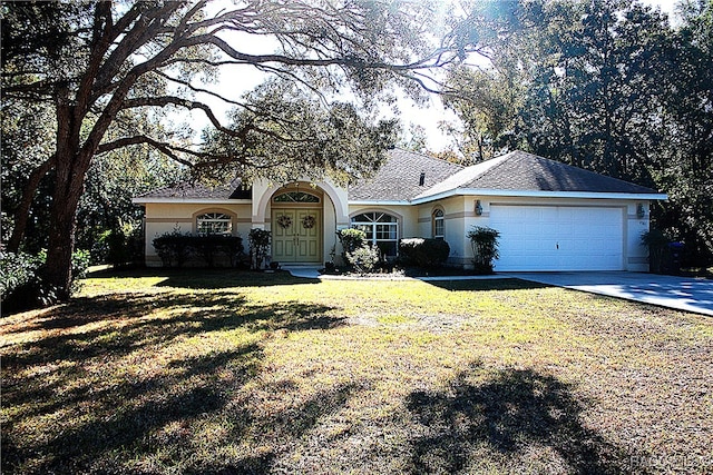 single story home featuring driveway, an attached garage, a front lawn, and stucco siding