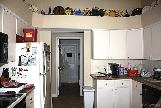 kitchen featuring white cabinetry, black dishwasher, dark tile patterned flooring, and decorative backsplash