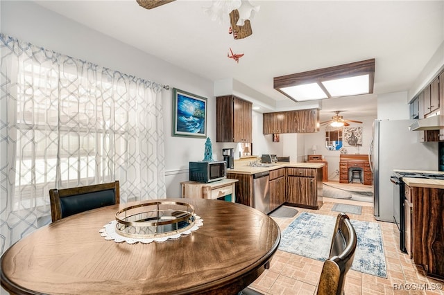 dining area with a ceiling fan