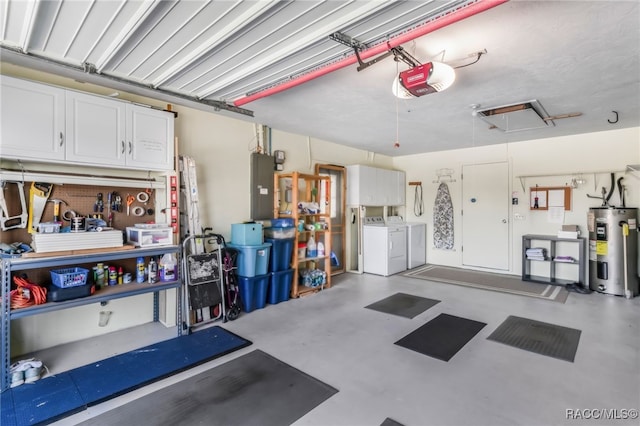 garage with a workshop area, a garage door opener, washing machine and dryer, electric water heater, and electric panel