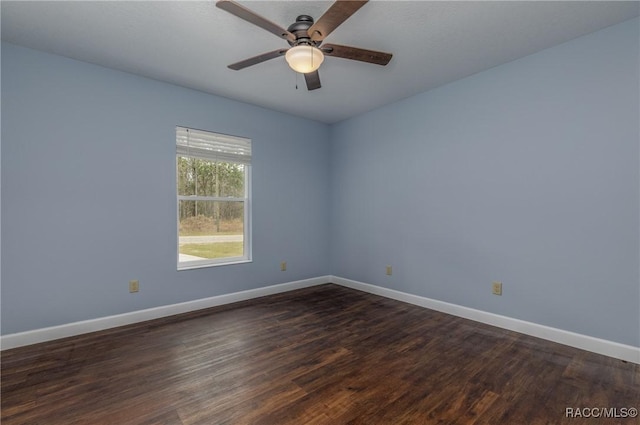 9459 N Camel Dr, Citrus Springs, FL 34434 - empty room featuring a ceiling fan and dark wood-style floors