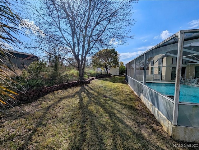 view of yard featuring a lanai