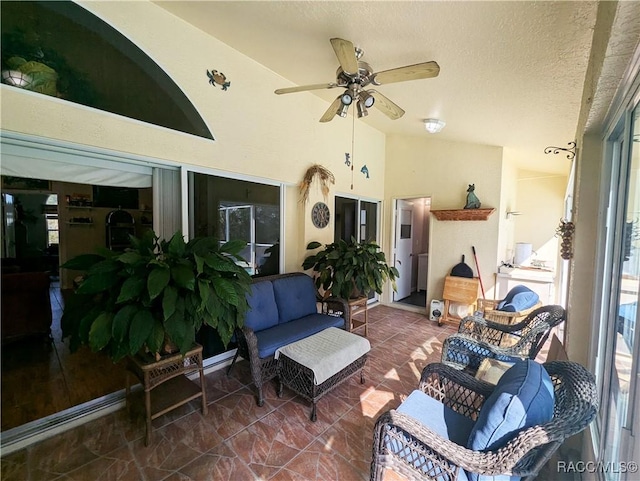 view of patio featuring an outdoor hangout area and ceiling fan