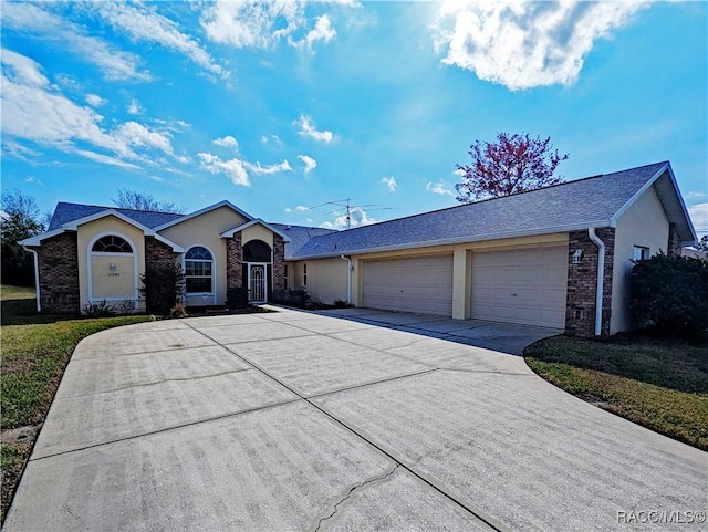 ranch-style home with a garage