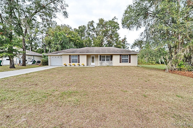 ranch-style home featuring a front yard and a garage