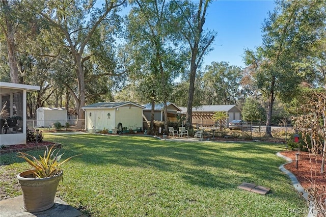 view of yard with a sunroom