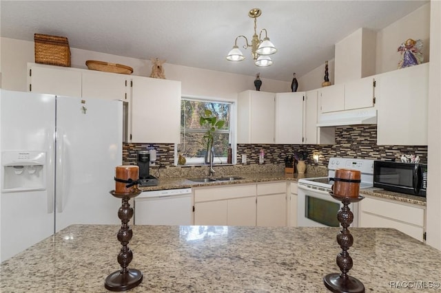 kitchen featuring sink, hanging light fixtures, white appliances, light stone countertops, and white cabinets