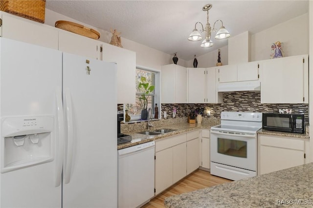 kitchen featuring white cabinetry, white appliances, sink, and pendant lighting