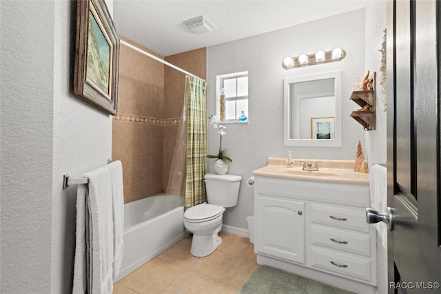 full bathroom featuring shower / bath combo, tile patterned flooring, a textured ceiling, toilet, and vanity